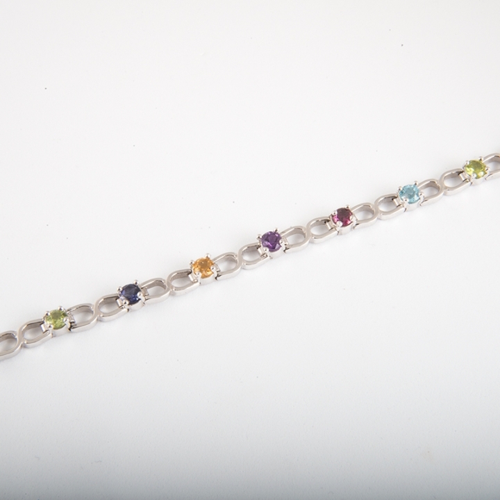 Bracciale Fantasia in oro bianco 18 kt con incastonate tormaline naturali di multicolor.