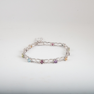 Bracciale Fantasia in oro bianco 18 kt con incastonate tormaline naturali di multicolor.