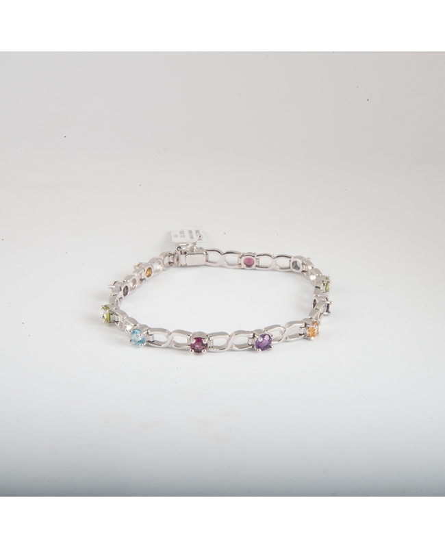 Bracciale Fantasia in oro bianco 18 kt con incastonate tormaline naturali di multicolor. Bracciale Fantasia in oro bianco 18 kt con incastonate tormaline naturali di multicolor.