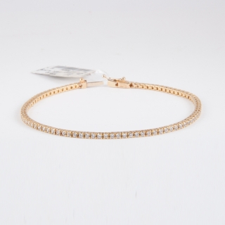 Bracciale tennis da donna, in oro giallo 18 kt. Duraliti con taglio brillante, lunghezza 18 cm.