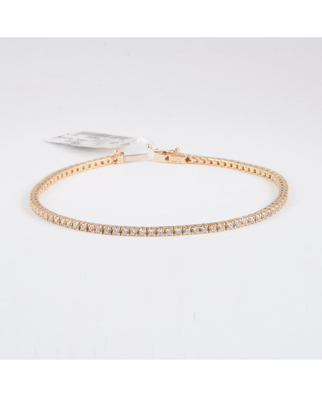 Bracciale tennis da donna, in oro giallo 18 kt. Duraliti con taglio brillante, lunghezza 18 cm.