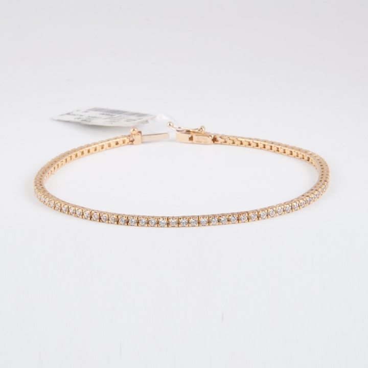 Bracciale tennis da donna, in oro giallo 18 kt. Duraliti con taglio brillante, lunghezza 18 cm.