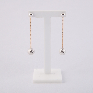 Orecchini pendenti in oro 18kt bicolore.