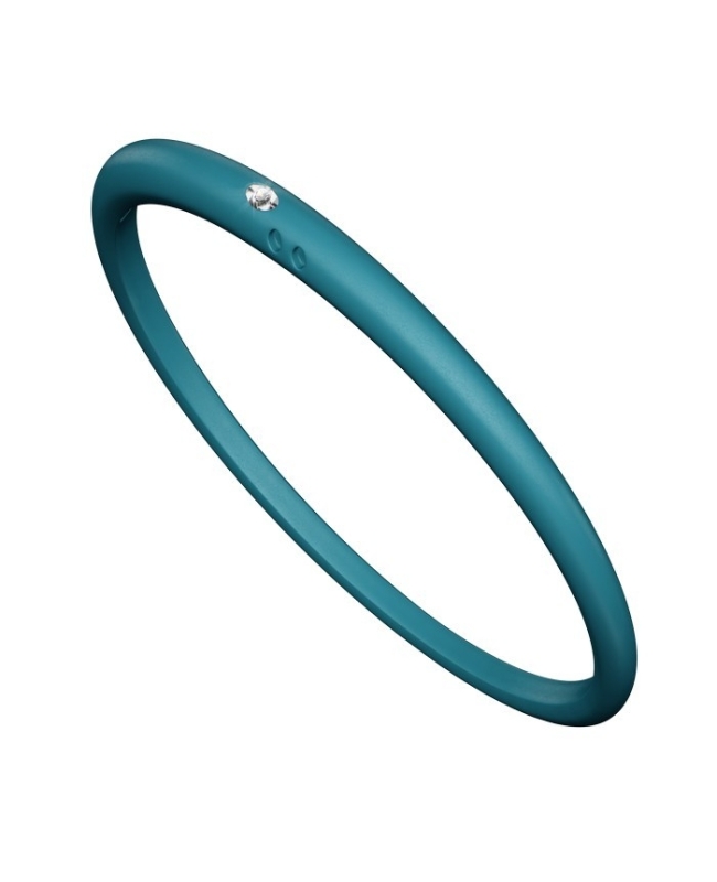 Bracciale unisex con diamante in castone d’argento 800 montato su silicone anallergico color blu mistico. Bracciale unisex con diamante in castone d’argento 800 montato su silicone anallergico color blu mistico.