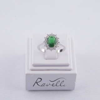 Anello in oro bianco 18 kt con smeraldo sintetico e contorno in duraliti taglio brillante.