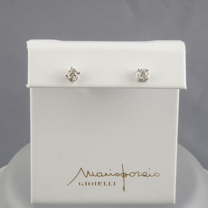 Orecchini Punto luce in oro bianco 18 kt con castone Starlight.