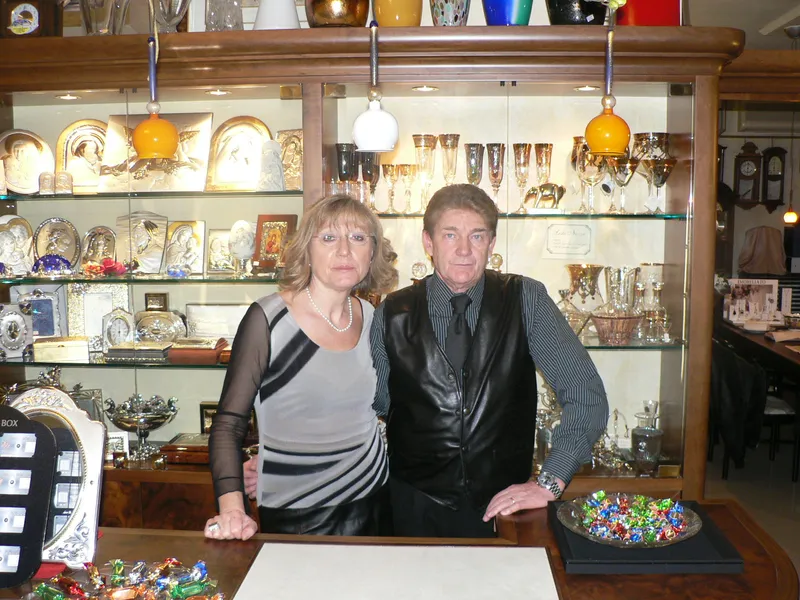 The Ravelli family behind the counter of the jewellery shop
