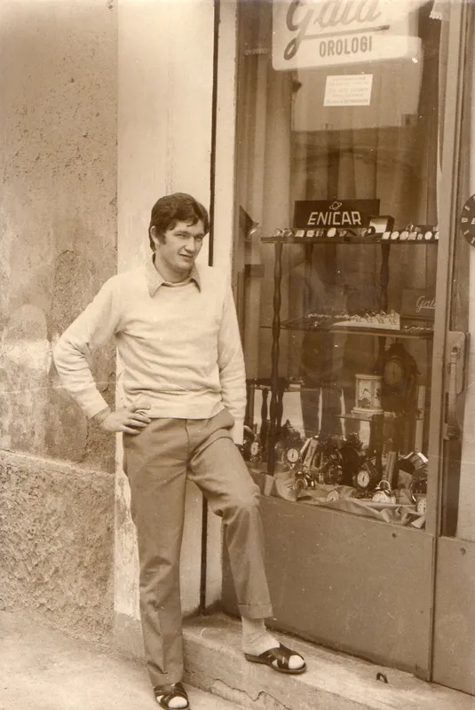Giovanni Ravelli in front of the window of the first watch shop
