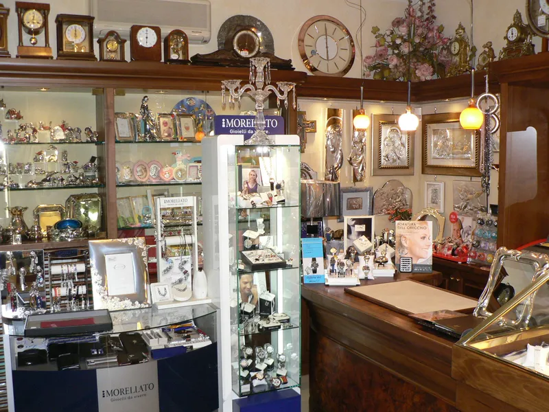 Interior of the shop with displays of watches, silverware and gifts